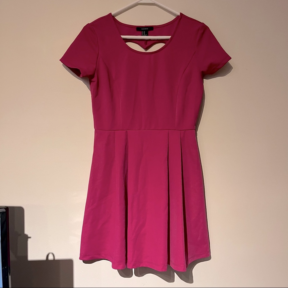 Pink Forever 21 heart cut out skater dress. Size Medium.